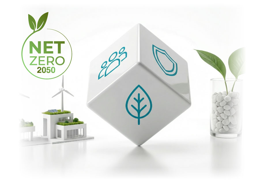 Studio cut out showing an ESG cube with icons for environment, social and governance beside a small building model and leaf on a clean white background