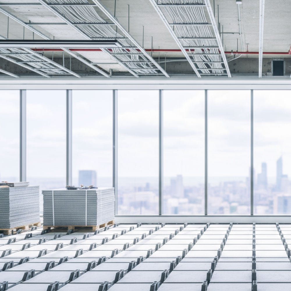 Commercial office fit-out: premium lobby and open-plan floor with phased works